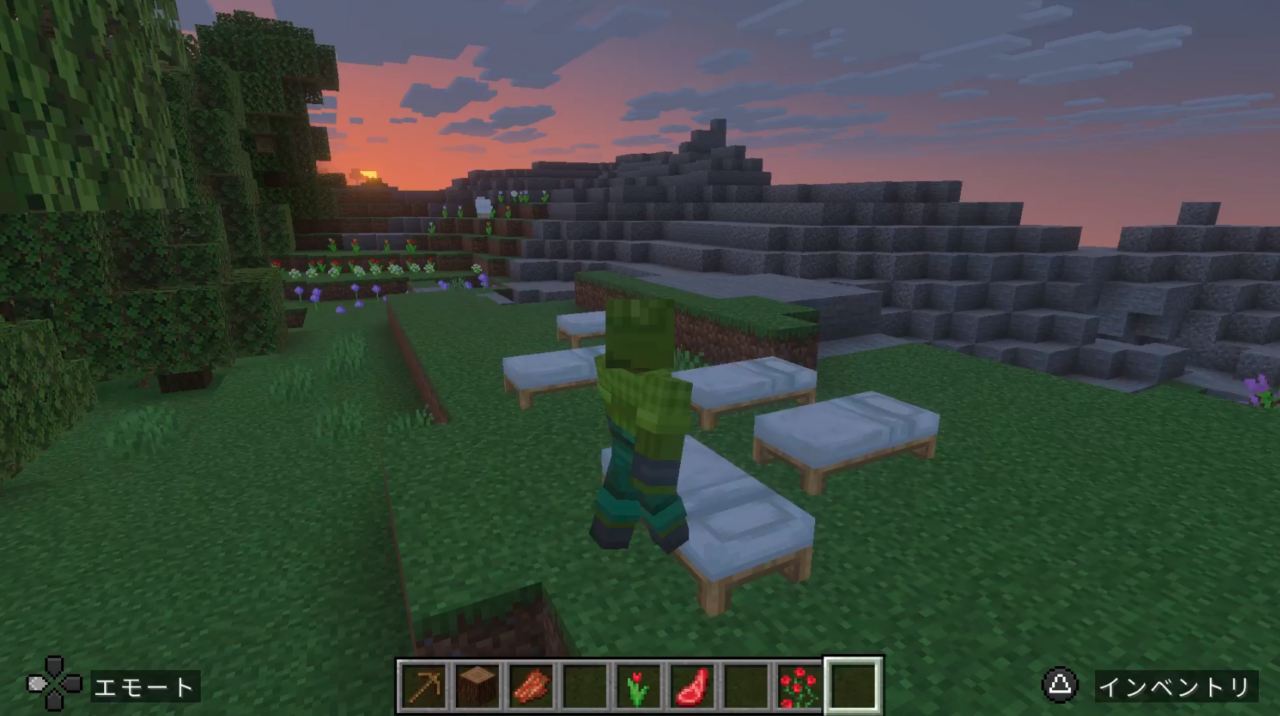 夕焼けをバックにベッドで眠る